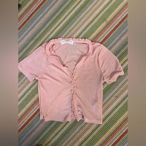 dainty pink ruffled button up top!